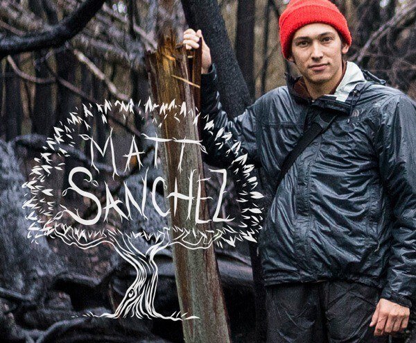 Arborist Matt Sanches standing in a scorched forest.