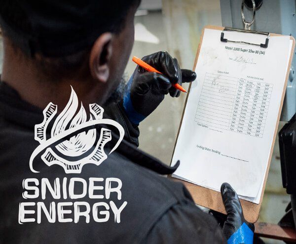 Snider Energy Manager writing on all weather paper with weatherproof pen.