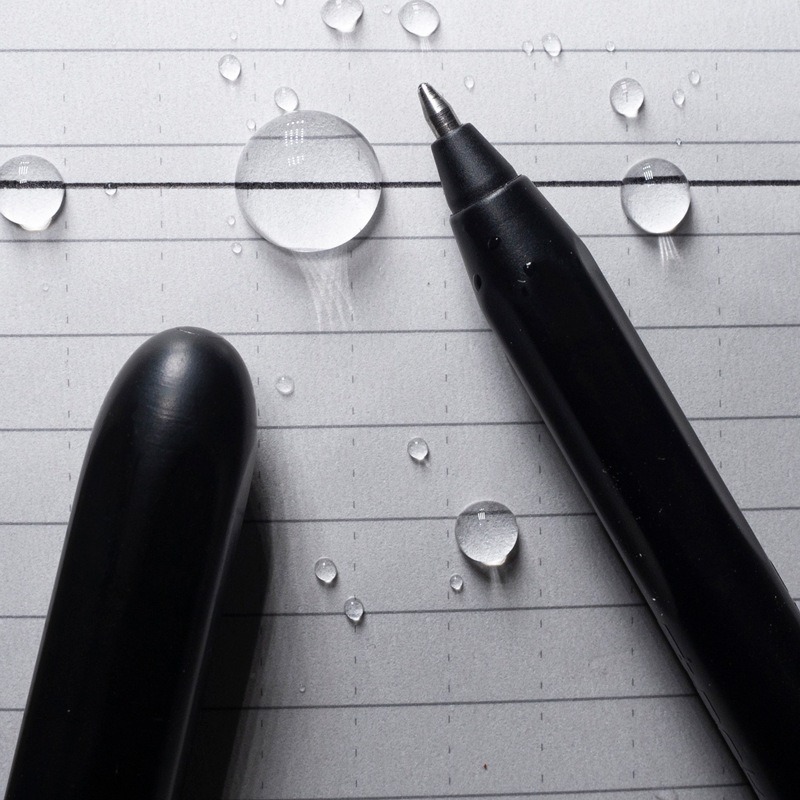 Pocket pen on wet paper with ink written through water.