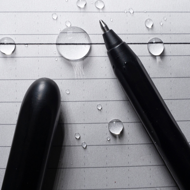 Pocket pen on wet paper with ink written through water.