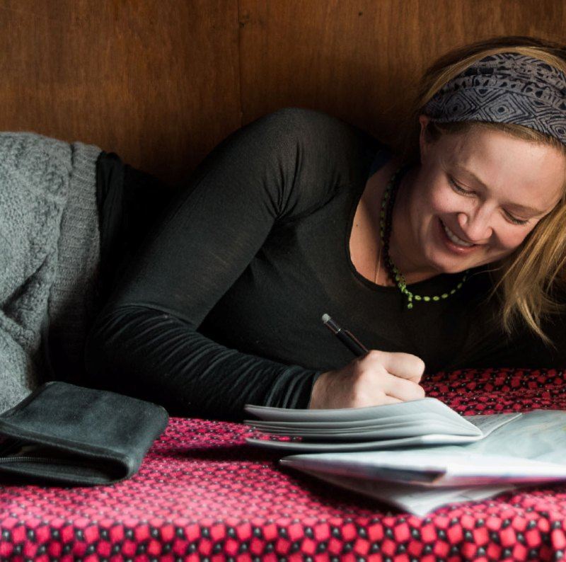 Mountaineer journaling.