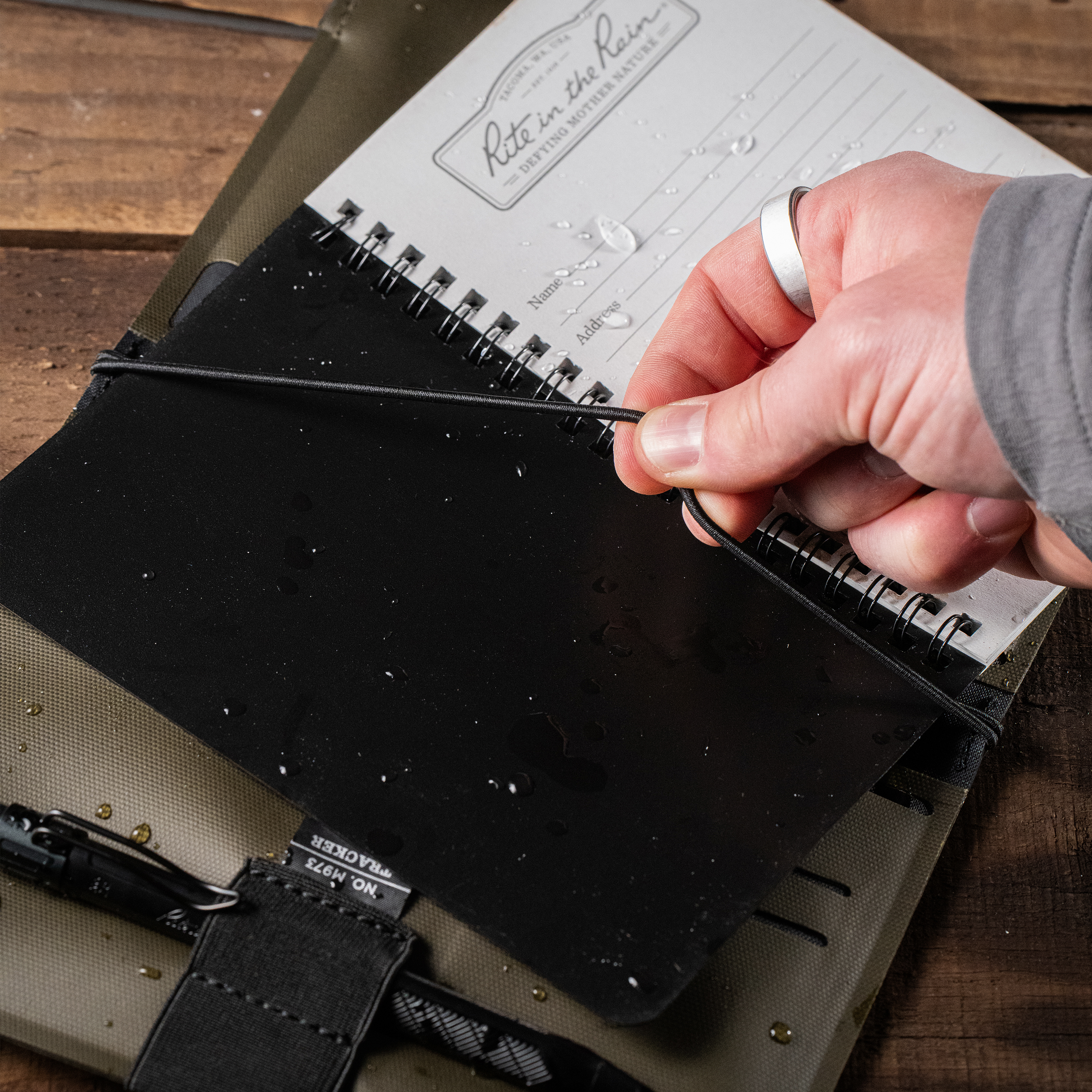 Monsoon Tracker Cover inside flexible elastic cords in spine
