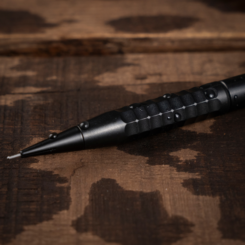 Twist pencil tip with knurled-metal grip
