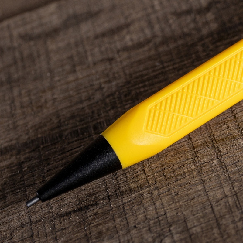 Mechanical pencil triangular barrel and textured grip.
